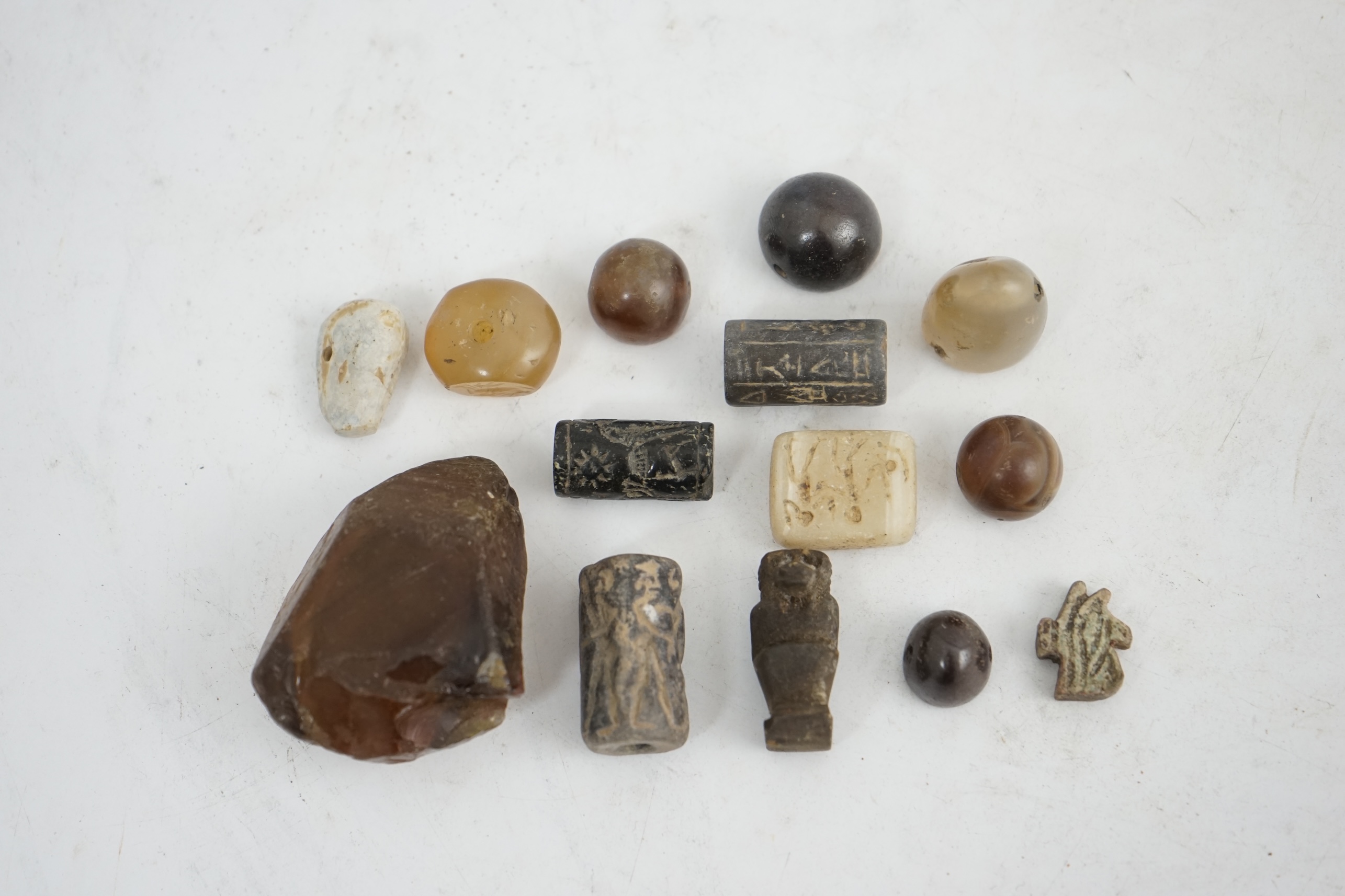 A collection of Ancient Egyptian beads, seals, etc., Acquired 1990s